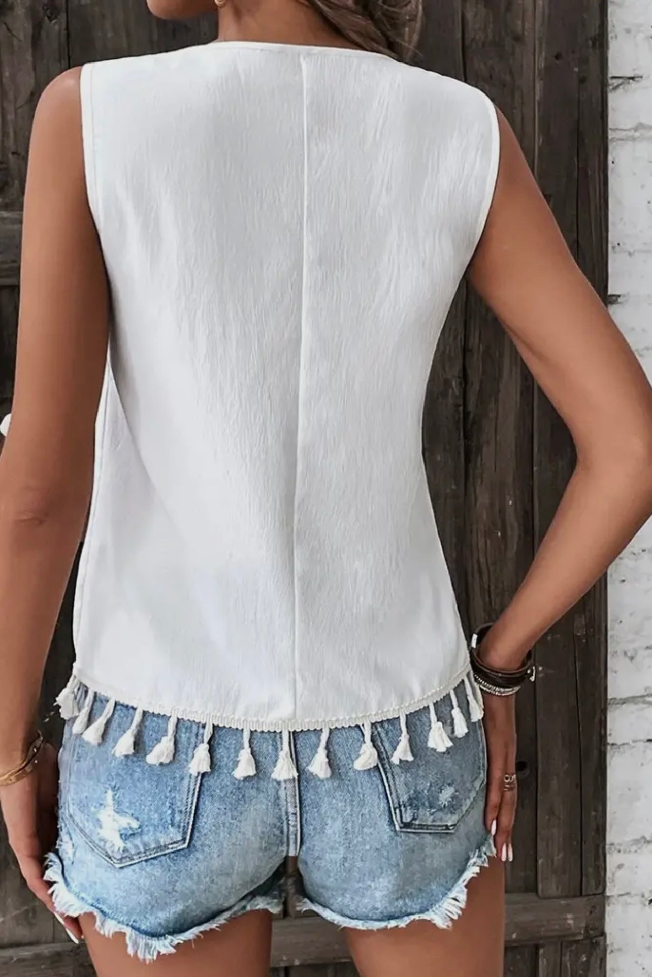 Embroidered Tasseled Hem Tank